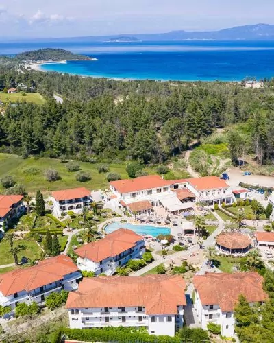 Aerial drone view of Paliouri Beach Chrousso Village in Kassandra Sithonia penisula  Chalkidiki Greece