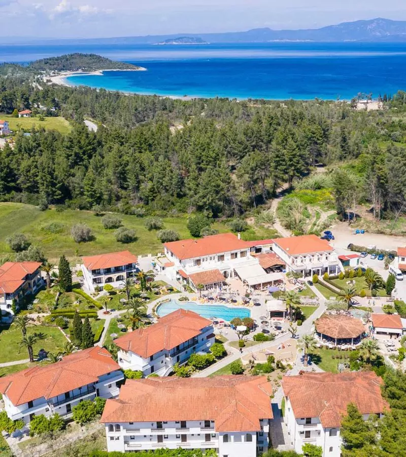 Aerial drone view of Paliouri Beach Chrousso Village in Kassandra Sithonia penisula  Chalkidiki Greece